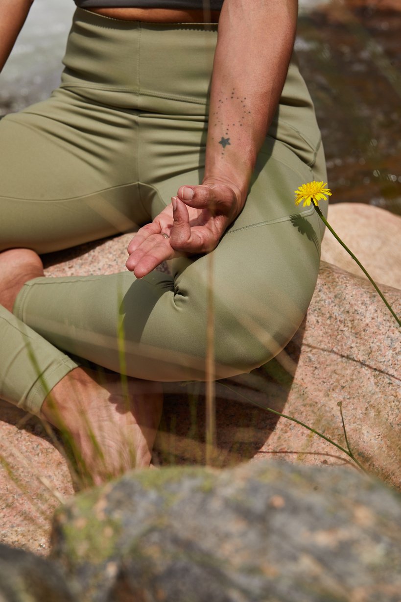 Woman Doing Yoga Exercise Outdoors